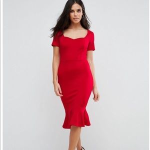 Red midi dress. Sweetheart neckline. Peplum bottom